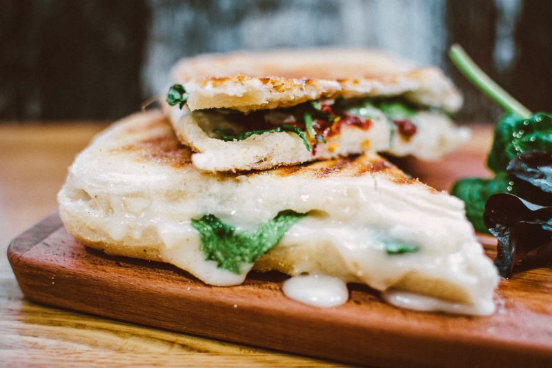 Meatball marinara sub smothered in sauce and melted cheese