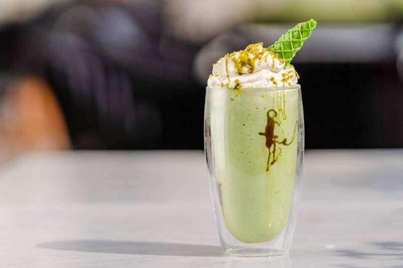 Thick creamy milkshake with whipped cream